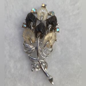 Elegant Silver and Black Floral Brooch